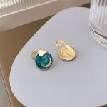 Elegant Sun and Moon Asymmetrical Enamel Earrings - Image 3