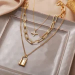 Elegant Multi-Layer Lock and Star Pendant Necklace - Image 2