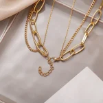 Elegant Multi-Layer Lock and Star Pendant Necklace - Image 4