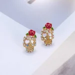 Trendy Skull Earrings with Rhinestone Accents - Image 3
